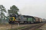 CSX 8676 & HLCX 7181 lead a grain train onto the Wilmington sub